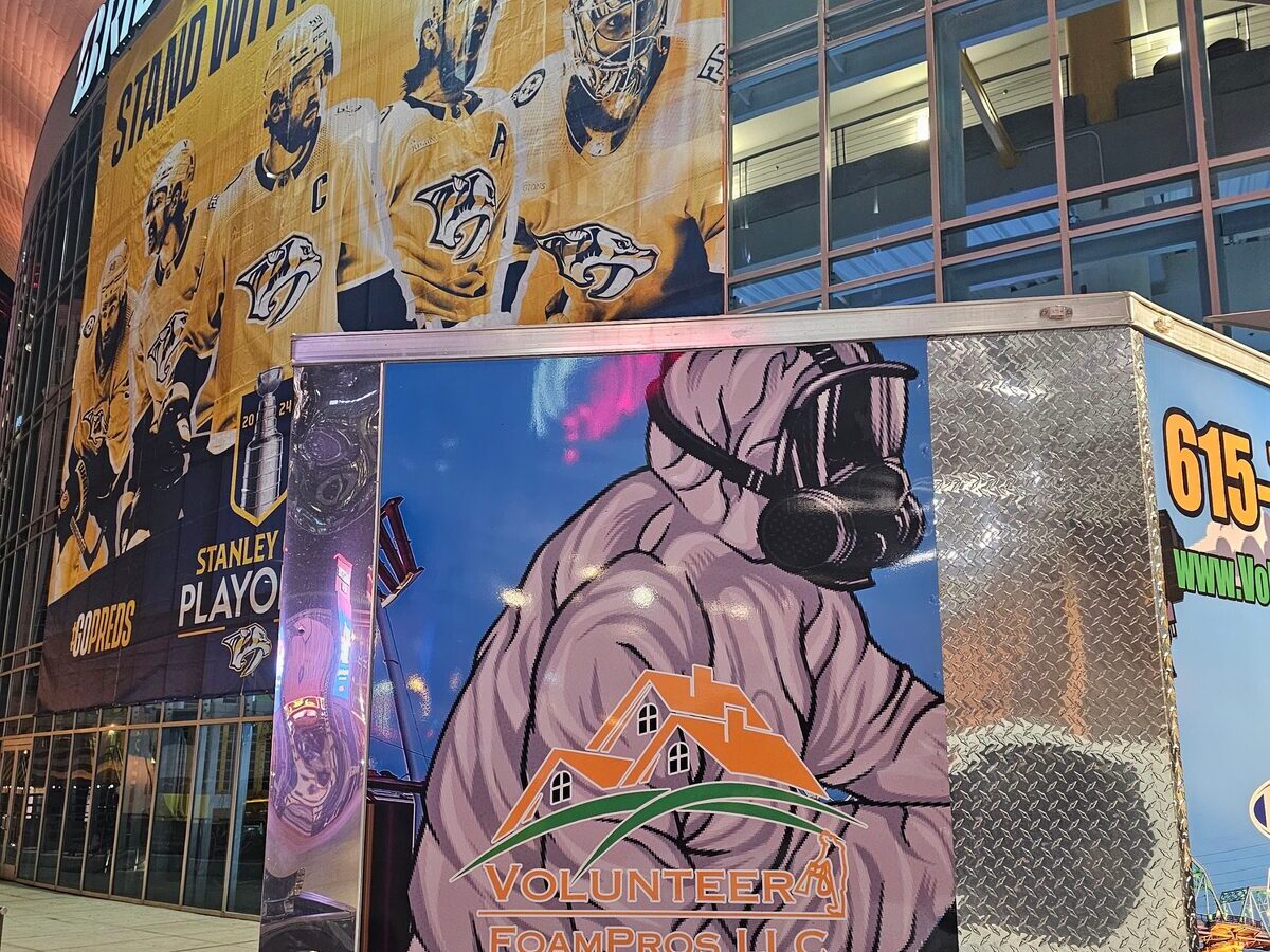 The Volunteer FoamPros spray foam trailer parked outside Bridgestone Arena in downtown Nashville